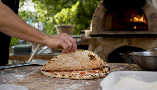 Undercooked pizza base pale underside