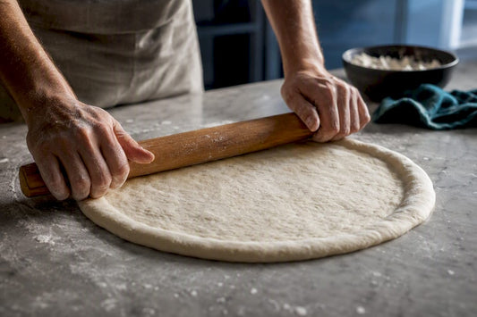 Rolling pizza dough while preserving raised rim
