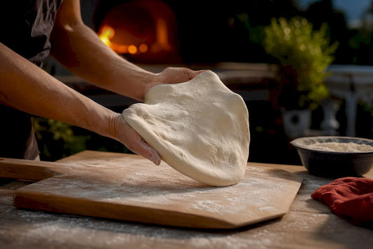 Hands stretching high hydration pizza dough